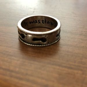 Silver ring with footprint inlay